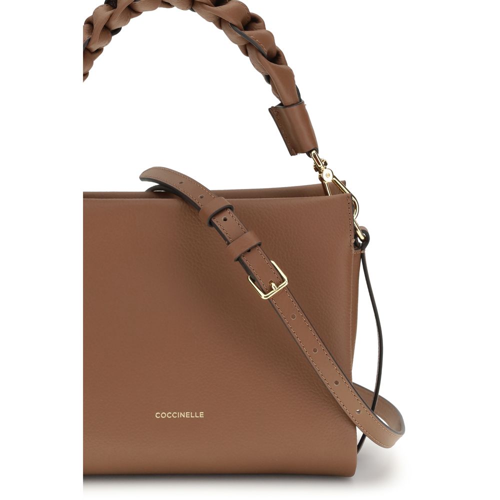 Sac à main Bos Taurus en cuir de veau beige Coccinelle